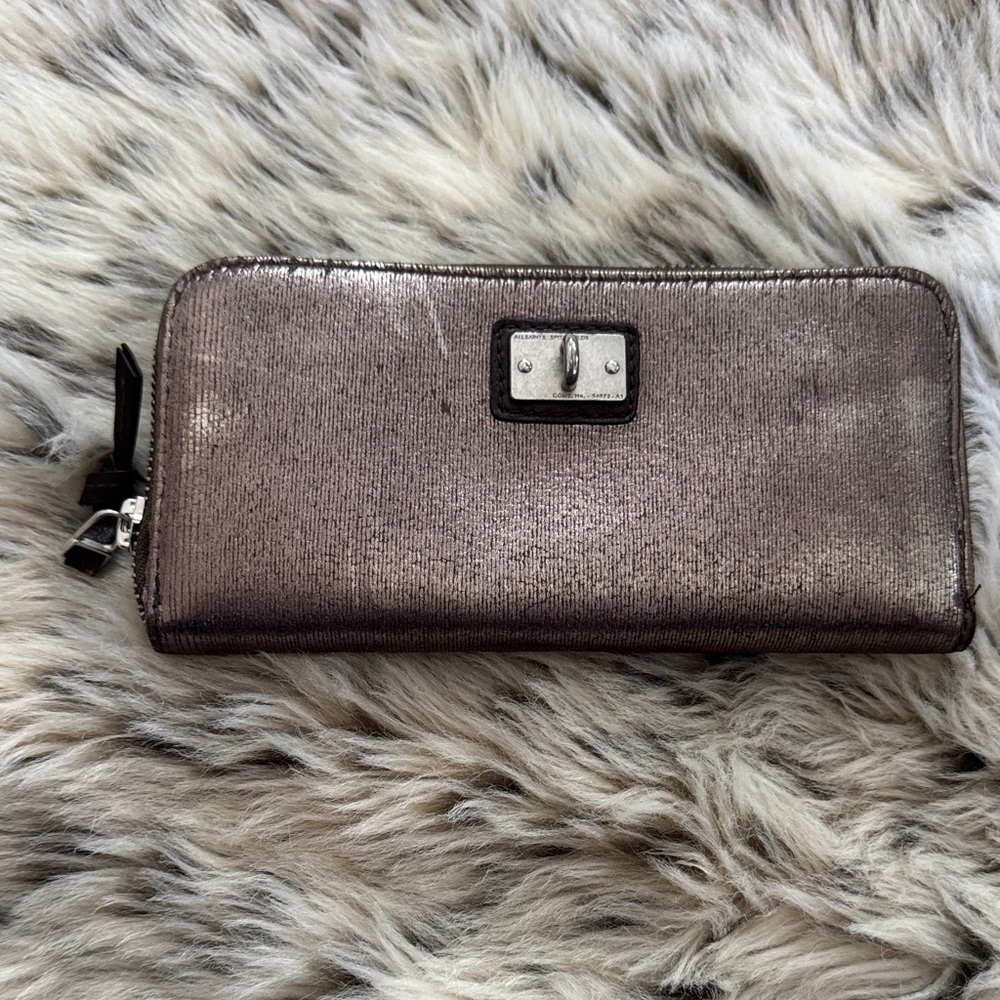 All Saints Metallic Zip Wallet with Silver Badge.